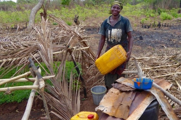 (ii}A female beneficiary at work